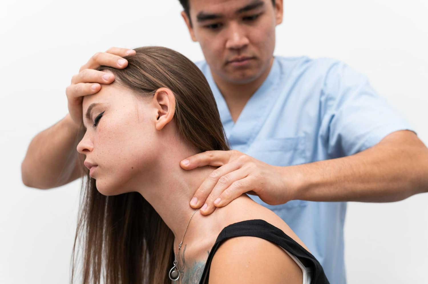 Chiropractic adjustment helping improve neck mobility and posture after a car accident