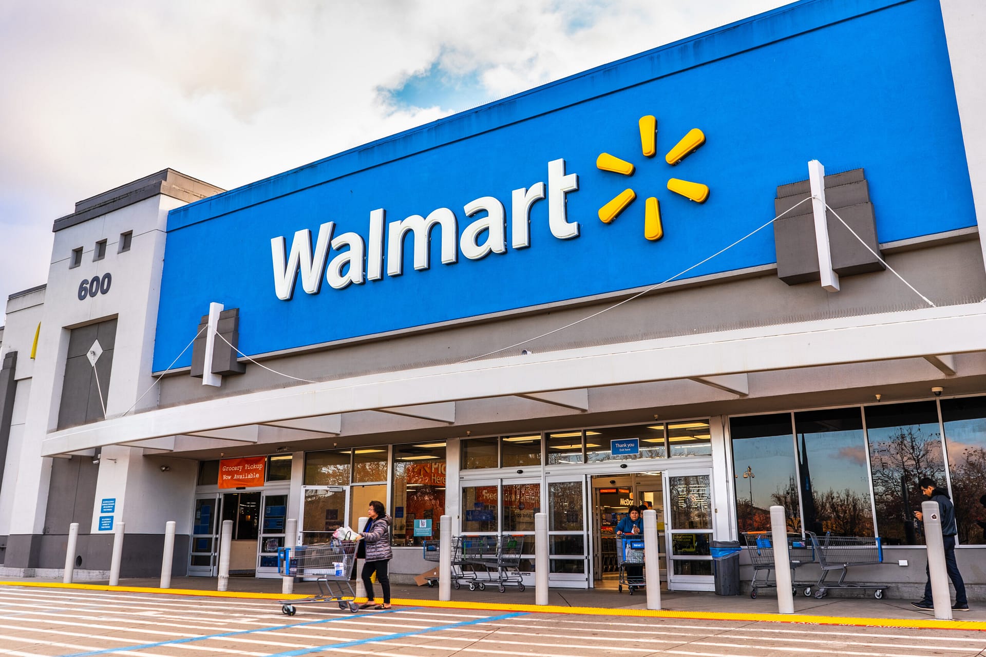 People shopping at a Walmart store