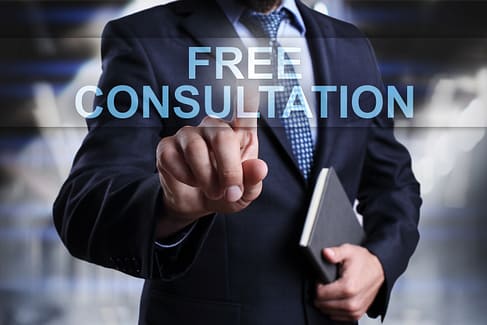 The Differences Between Truck Accident and Car Wreck Claims 4 Businessman is pressing on virtual screen and selecting Free consultation for truck accident claims.