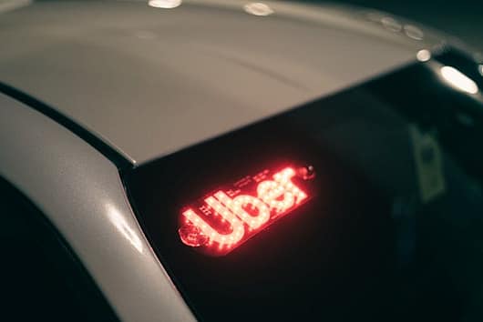 car with Uber sign - Stockton Rideshare Accident Lawyers