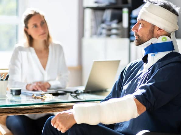personal injury attorney is discussing a cse with a client - Oakland Personal Injury Lawyers