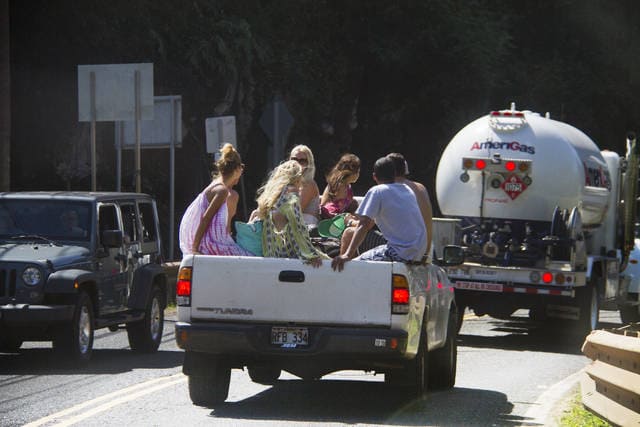 People riding in the bed of a pickup truck while driving-the law by state riding in the bed of a pickup truck