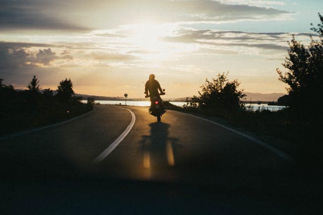 motorbike rider on the road - Riverside Motorcycle Accident Lawyers