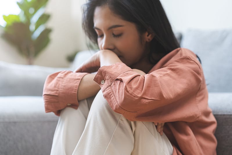 Sad, unhappy. Alone young woman, girl expression face thin. League City Wrongful Death Lawyers