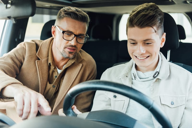 Father teaching his son to drive - Teen Safe Driving